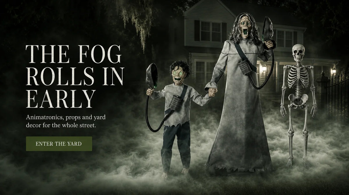 THE FOG ROLLS IN EARLY. Animatronics, props and yard decor for the whole street. ENTER THE YARD